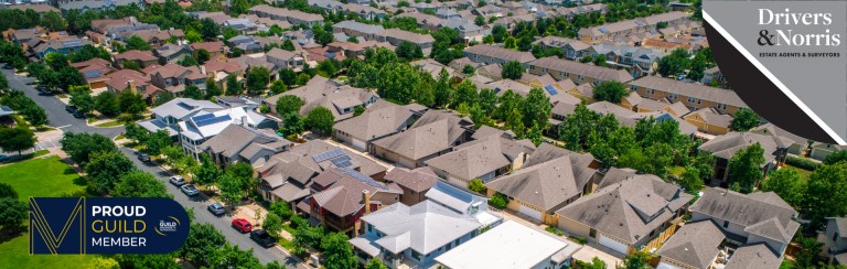 UK house prices fall as market continues to slow
